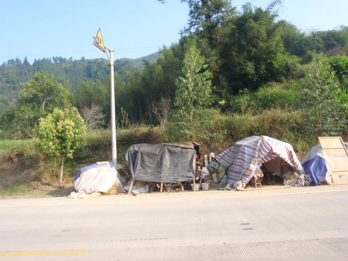 Temporary dwellings used by a highway construction crew.